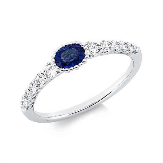Ring 18 kt WG, 12 Brill. 0,35 ct, TW-si, 1 Saphir 0,39 ct blau