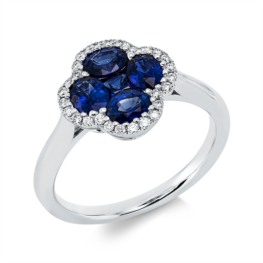 Ring 18 kt WG, 28 Brill. 0,13 ct, TW-si, 1 Saphir 0,16 ct blau, 4 Saphire 1,21 ct blau