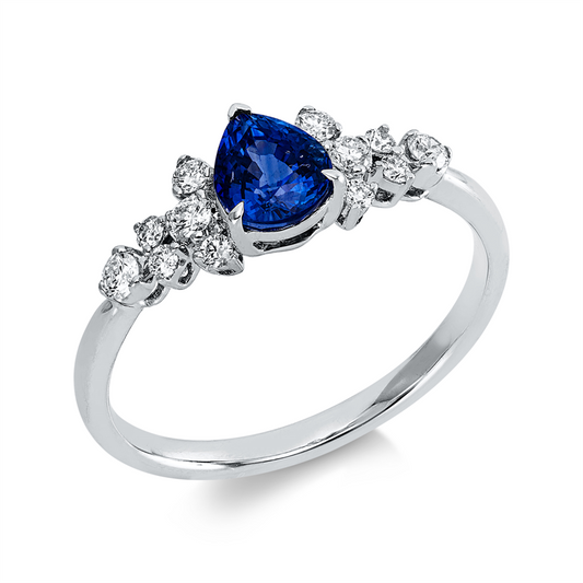 Ring 18 kt WG, 12 Brill. 0,22 ct, TW-si, 1 Saphir 0,89 ct blau