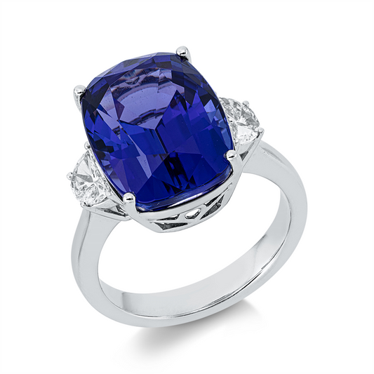 Ring 18 kt WG, 2 Halbmond 0,46 ct, TW-si, 1 Tansanit 11,52 ct blau