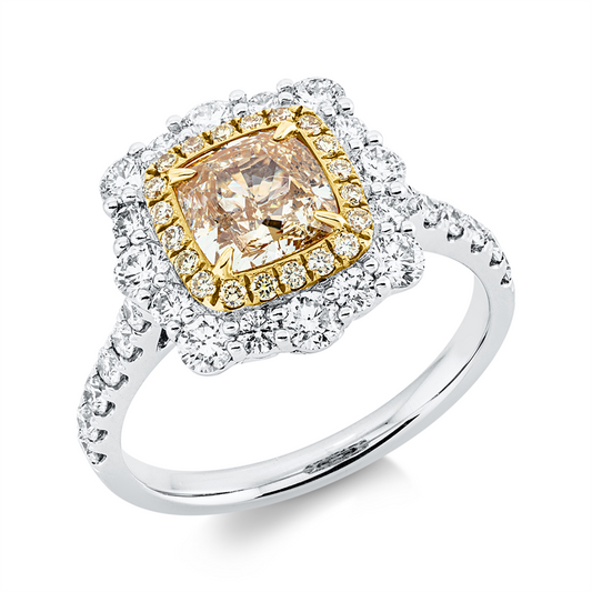 Ring 18 kt WG+GG, 16 Brill. 0,67 ct, TW-pi, 12 Brill. 0,25 ct, TW-pi, 1 Cushion 1,40 ct, gelb-si, 20 Brill. 0,13 ct, gelb