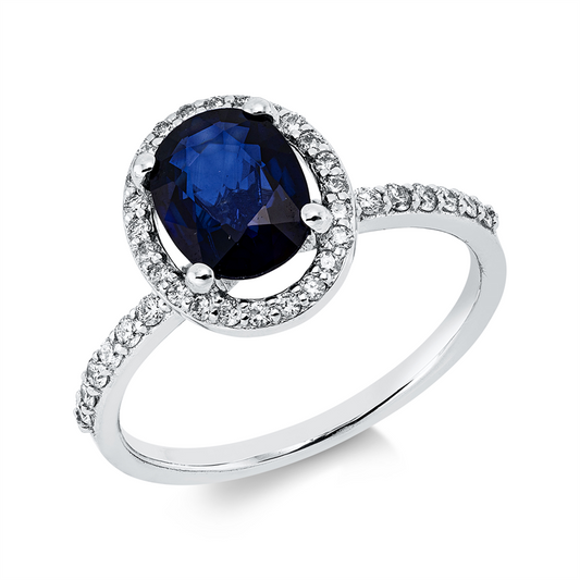Ring 18 kt WG, 16 Brill. 0,18 ct, F-si, 24 Brill. 0,13 ct, F-si, 1 Saphir 1,43 ct blau