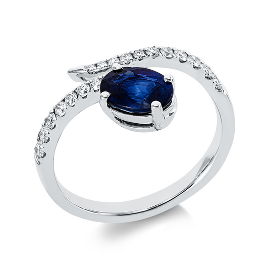 Ring 18 kt WG, 12 Brill. 0,19 ct, TW-si, 7 Brill. 0,05 ct, TW-si, 1 Saphir 0,97 ct blau