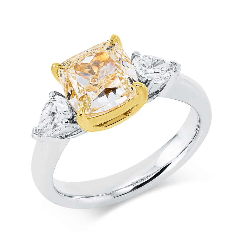 Ring 18 kt WG+GG, 2 Tropfen 0,64 ct, TW-si, 1 Cushion 3,01 ct, gelb