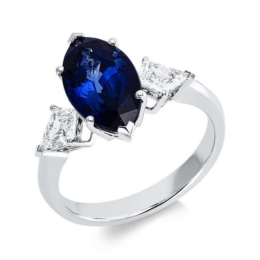 Ring 18 kt WG, 2 Fant-Schl. 0,63 ct, F-vsi, 1 Saphir 3,87 ct blau