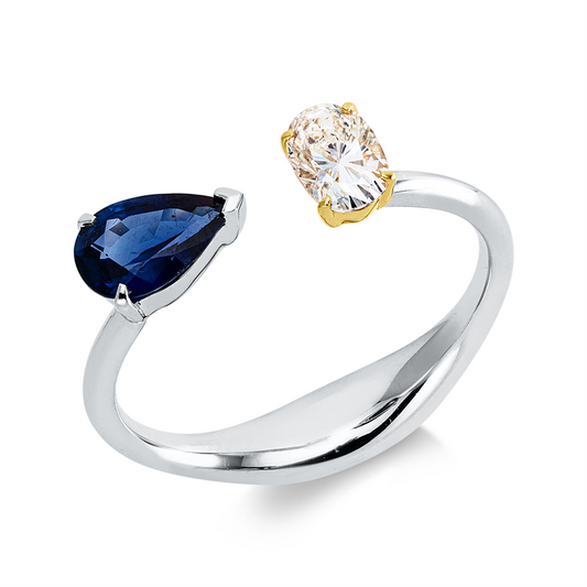 Ring 18 kt WG+GG, 1 Oval 0,36 ct, W-si, 1 Saphir 0,55 ct blau