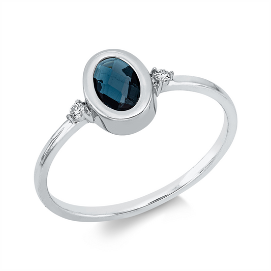 Ring 18 kt WG, 2 Brill. 0,03 ct, TW-si, 1 Topas 0,49 ct Lond. blue