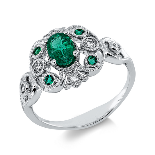 Ring 18 kt WG, 6 Brill. 0,11 ct, TW-si, 1 Smaragd 0,55 ct grün, 4 Smaragde 0,08 ct grün
