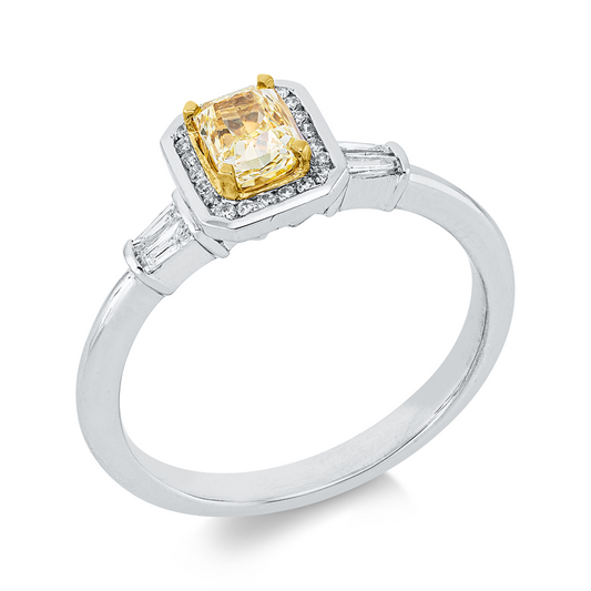 Ring 18 kt WG+GG, 1 Radiant 0,49 ct, gelb, 4 Trap. 0,06 ct, TW-si, 22 Brill. 0,11 ct, TW-si