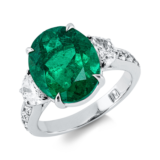 Ring 18 kt WG, 2 Halbmond 0,58 ct, F-vvs/vs, 10 Brill. 0,33 ct, F-vvs/vs, 1 Smaragd 5,35 ct grün