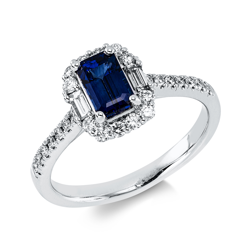 Ring 18 kt WG, 26 Brill. 0,31 ct, W-si, 2 Bag. 0,11 ct, W-si, 1 Saphir 1,16 ct blau