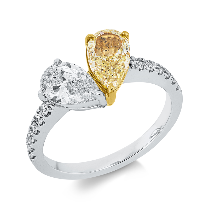 Ring 18 kt WG+GG, 1 Tropfen 0,91 ct, TW-si, 12 Brill. 0,21 ct, TW-si, 1 Tropfen 1,13 ct, gelb