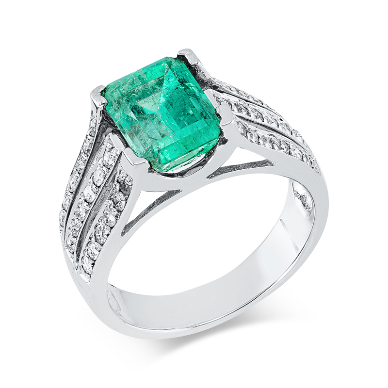 Ring 18 kt WG, 36 Brill. 0,50 ct, F-pi, 1 Smaragd 2,42 ct grün