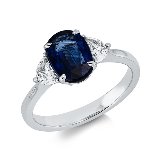 Ring 18 kt WG, 2 Halbmond 0,34 ct, F-vsi, 1 Saphir 2,00 ct blau