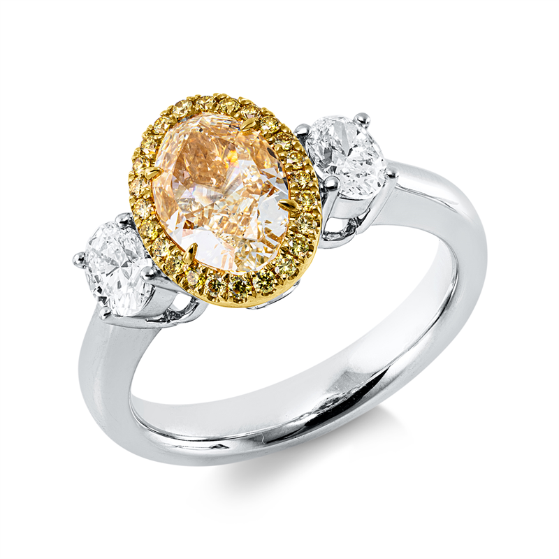 Ring 18 kt WG+GG, GIA, 2 Oval 0,61 ct, TW-si, 1 Oval 2,00 ct, gelb-vs2, 24 Brill. 0,13 ct, gelb-si