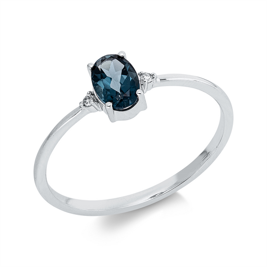 Ring 18 kt WG, 2 Brill. 0,02 ct, TW-si, 1 Topas 0,55 ct Lond. blue