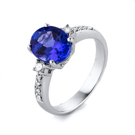 Ring 18 kt WG, 10 Brill. 0,19 ct, TW-si, 1 Tansanit 2,79 ct blau