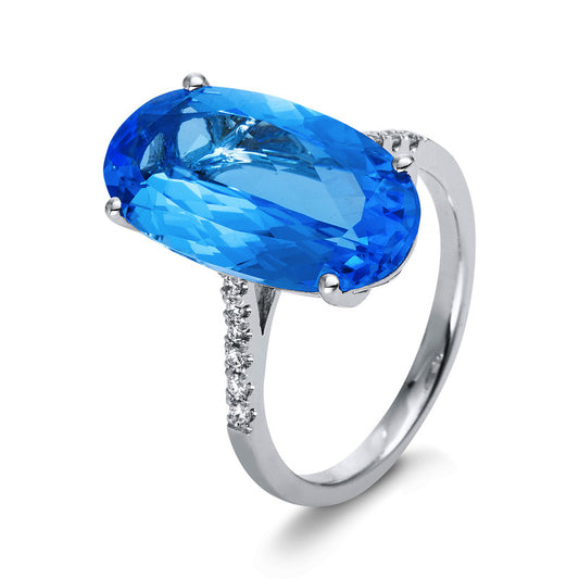 Ring 18 kt WG, 12 Brill. 0,12 ct, TW-si, 1 Topas 11,90 ct blau