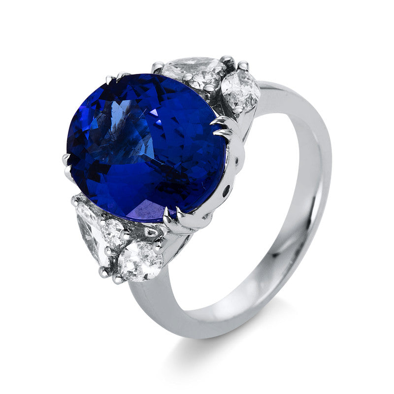 Ring 18 kt WG, 4 Nav. 0,80 ct, TW-si, 2 Brill. 0,11 ct, TW-si, 1 Tansanit 7,14 ct blau