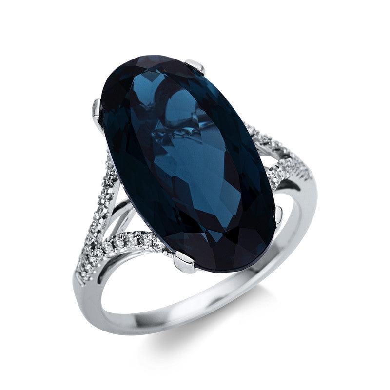 Ring 18 kt WG, 36 Brill. 0,18 ct, TW-si, 1 Topas 11,10 ct Lond. blue