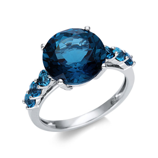 Ring 18 kt WG, 6 Topase 0,80 ct Lond. blue, 1 Topas 6,70 ct Lond. blue