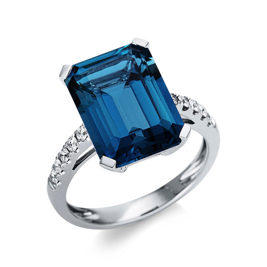 Ring 18 kt WG, 10 Brill. 0,23 ct, TW-si, 1 Topas 10,00 ct blau