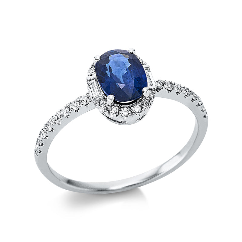 Ring 18 kt WG, 28 Brill. 0,18 ct, TW-si, 2 Bag. 0,04 ct, TW-si, 1 Saphir 1,05 ct blau