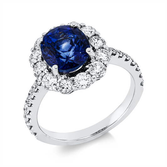 ABVERKAUF, Ring 18 kt WG, 12 Brill. 0,95 ct, TW-si, 16 Brill. 0,31 ct, TW-si, 1 Saphir 3,57 ct blau