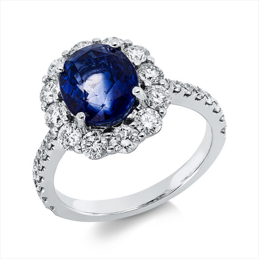 Ring 18 kt WG, 12 Brill. 0,95 ct, TW-si, 16 Brill. 0,31 ct, TW-si, 1 Saphir 3,57 ct blau
