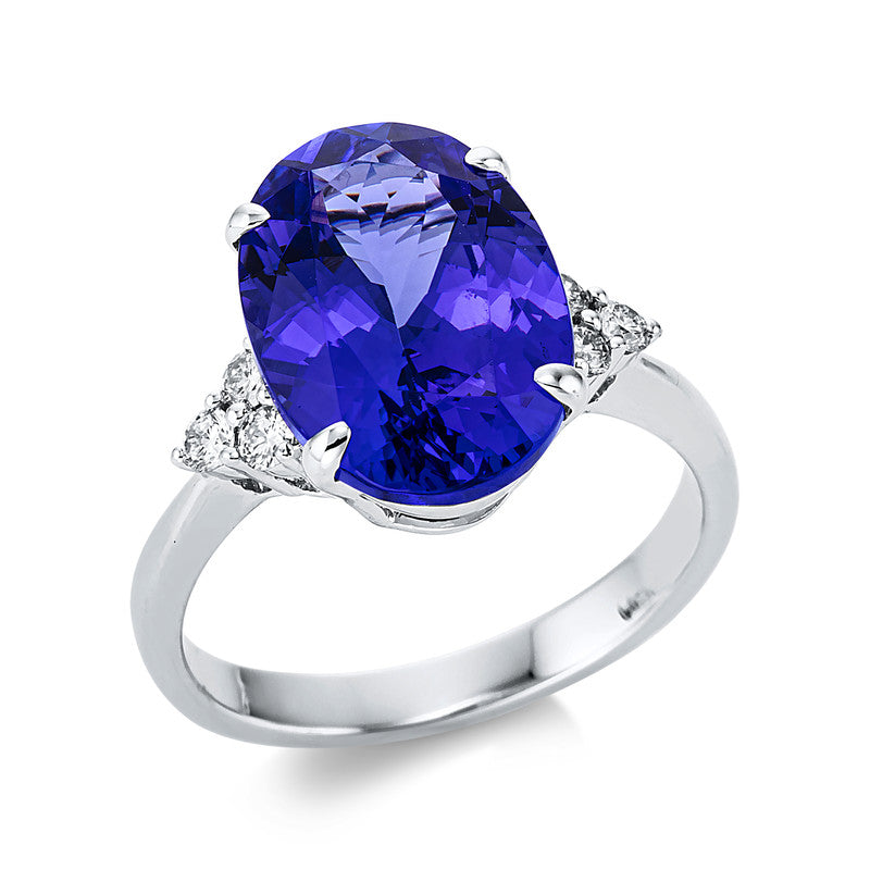 Ring 18 kt WG, 6 Brill. 0,21 ct, TW-si, 1 Tansanit 6,24 ct blau