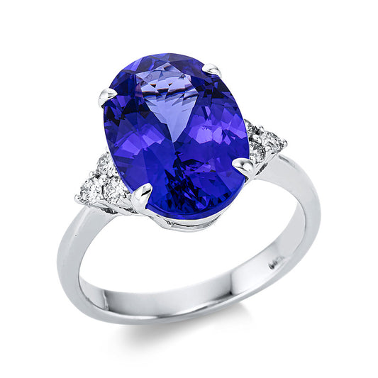 Ring 18 kt WG, 6 Brill. 0,21 ct, TW-si, 1 Tansanit 6,24 ct blau