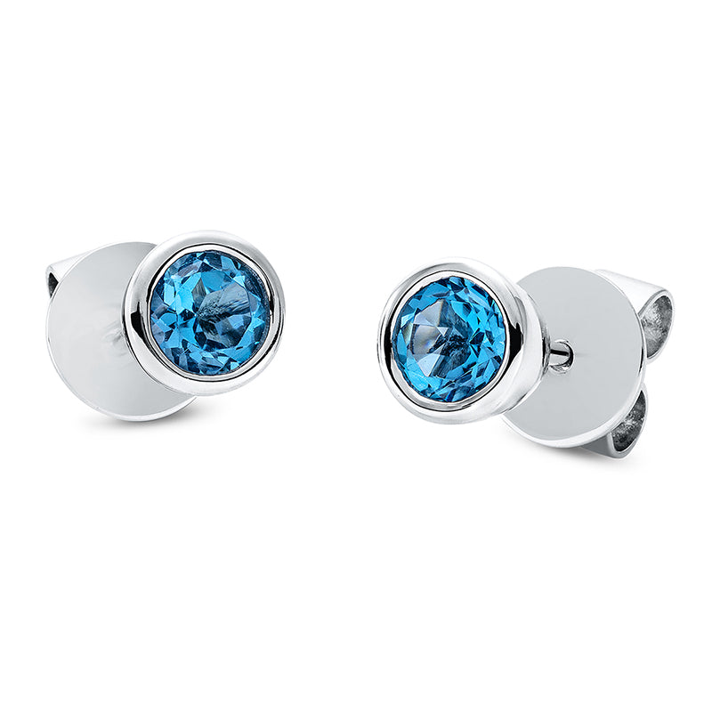 Ohrstecker 18 kt WG, 2 Topase 0,65 ct blau