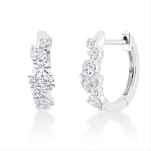 Creolen 18 kt WG, 4 Brill. 0,29 ct, TW-si, 2 Brill. 0,25 ct, TW-si, 8 Brill. 0,22 ct, TW-si