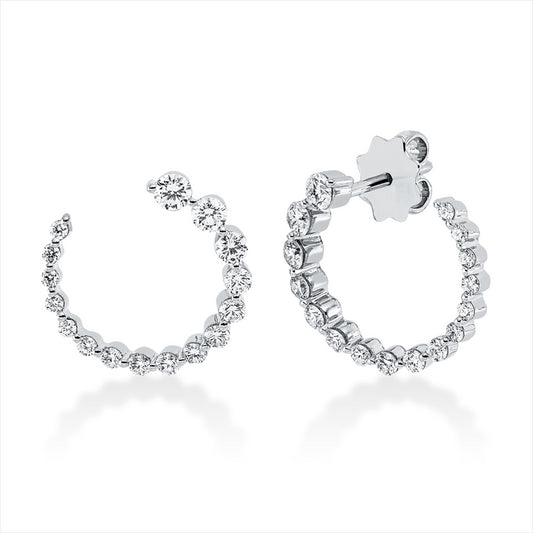 Ohrstecker 18 kt WG, 18 Brill. 0,64 ct, TW-si, 14 Brill. 0,18 ct, TW-si