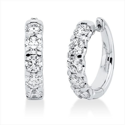 Creolen 18 kt WG, 10 GIA's, 3 Brill. 1,20 ct, F-vsi, 2 Brill. 0,80 ct, F-vvs2, 1 Brill. 0,40 ct, TW-vvs2, 4 Brill. 1,60 ct, TW-vsi