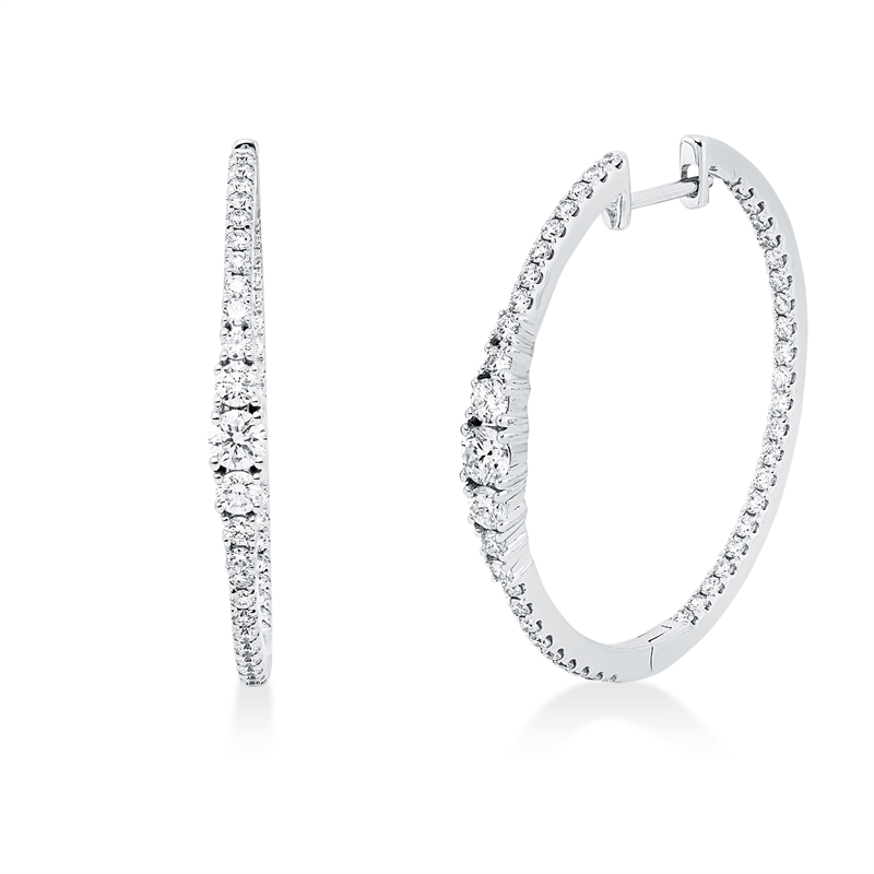Creolen 18 kt WG, 4 Brill. 0,21 ct, TW-si, 2 Brill. 0,23 ct, TW-si, 86 Brill. 0,76 ct, TW-si