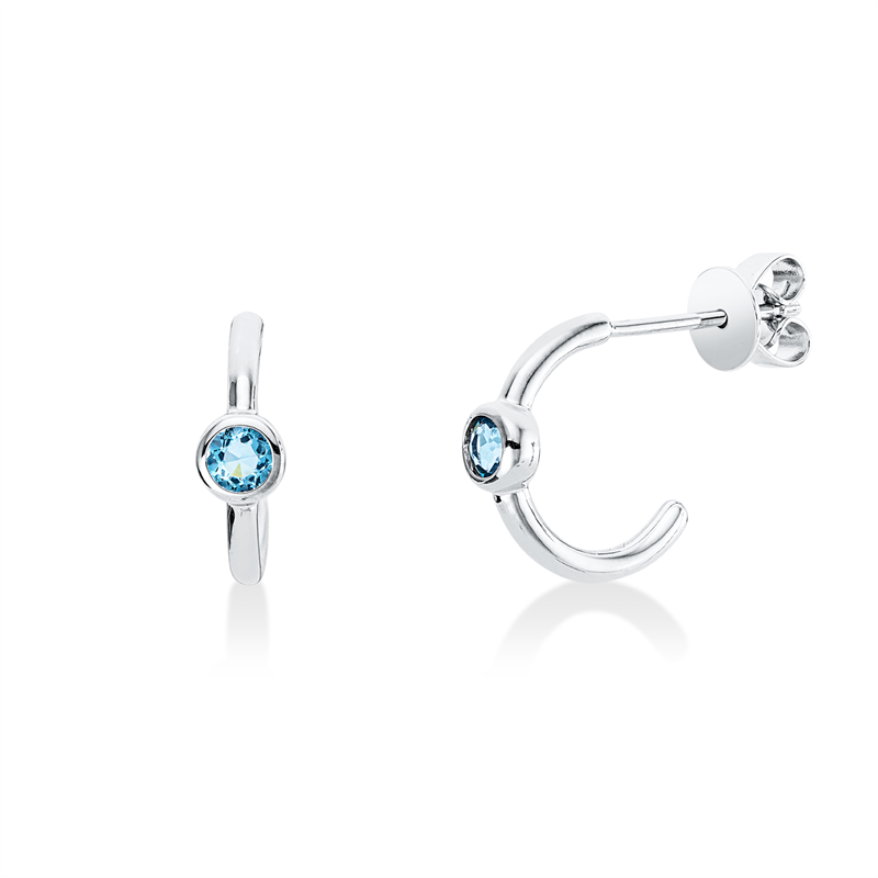Ohrschmuck 18 kt WG, 2 Topase 0,29 ct sky blue