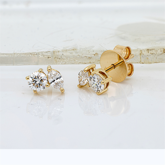 Ohrstecker 18 kt GG, 2 Nav. 0,25 ct, TW-si, 2 Brill. 0,46 ct, TW-si