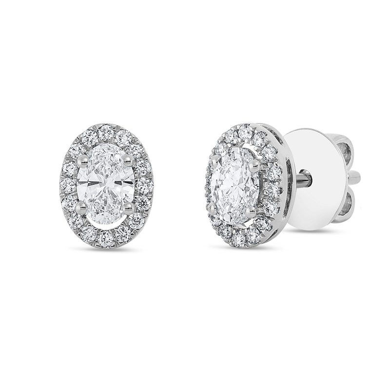 Ohrstecker 18 kt WG, 2 Oval 0,54 ct, TW-si, 32 Brill. 0,15 ct, TW-si
