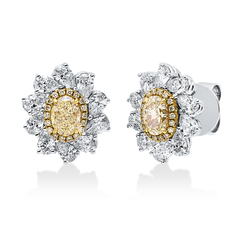 Ohrstecker 18 kt WG+GG, 2GIA, 20 Tro 1,86 ct, F-vvs/vs, 2 Oval 1,20 ct, 36 Brill. 0,13 ct, gelb
