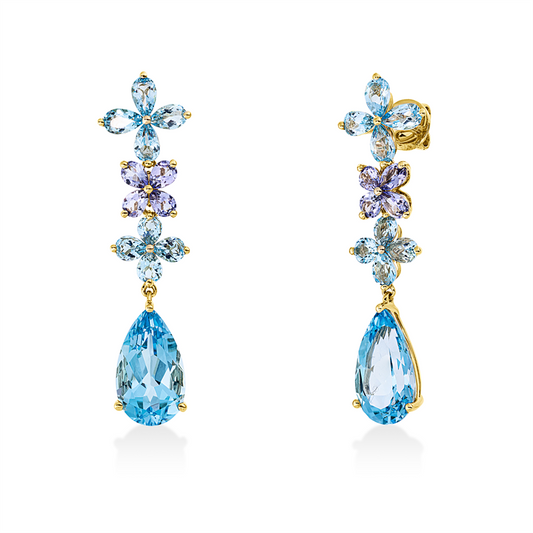 Ohrschmuck 18 kt GG, 16 Topase 3,20 ct blau, 2 Topase 9,20 ct blau, 8 Tansanit 1,30 ct blau