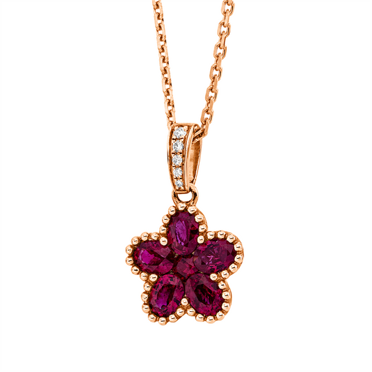 Anhänger 14 kt GG, mit Öse, 5 Brill. 0,02 ct, TW-si, 1 Rubin 0,08 ct rot, 5 Rubine 1,02 ct rot