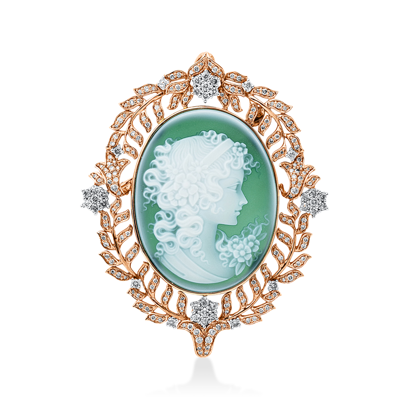 Brosche 18 kt RG+WG, 206 Brill. 1,64 ct, W-si/pi, 1 Farbsteine 18,20 ct grün