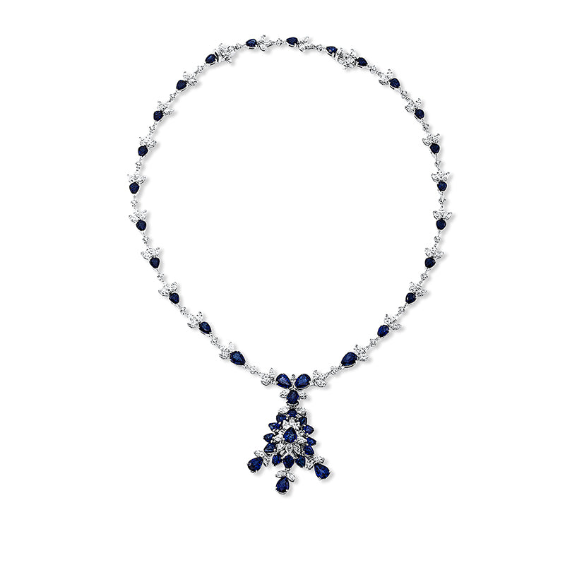 Collier 18 kt WG, 83 Nav. 6,67 ct, TW-vsi, 33 Brill. 2,13 ct, TW-vsi, 42 Saphire 21,80 ct blau