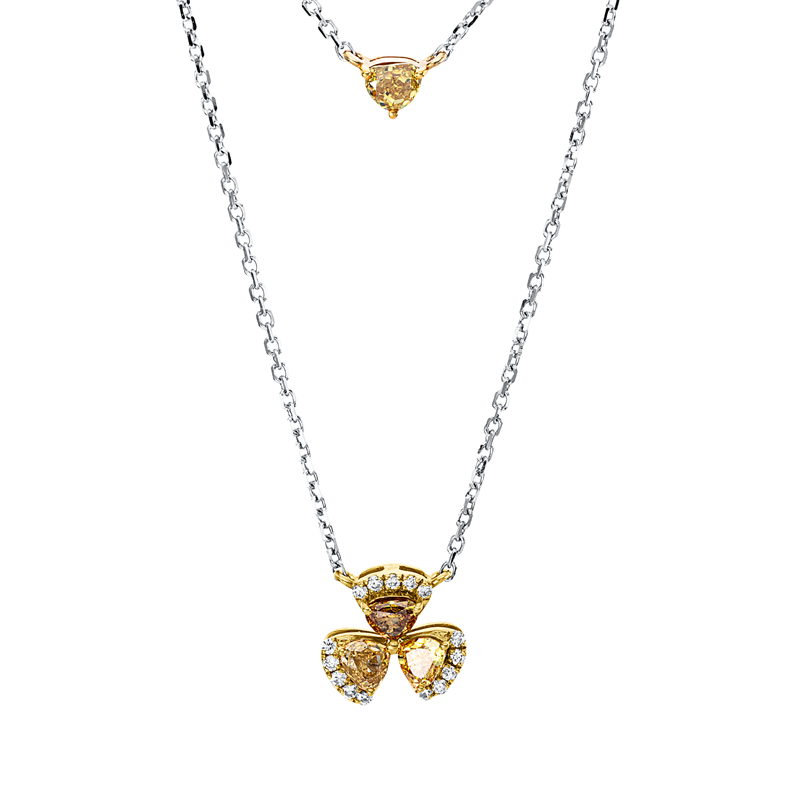 Collier 18 kt WG+GG, 19 Brill. 0,16 ct, TW-si, 4 Fant-Schl. 0,58 ct, gelb