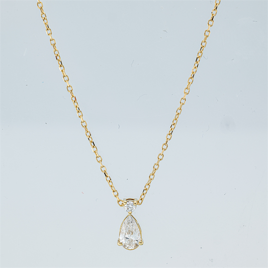 Collier 18 kt GG, mit ZÖ 40 cm + 42 cm, 1 Tropfen 0,30 ct, TW-si, 1 Brill. 0,04 ct, TW-si