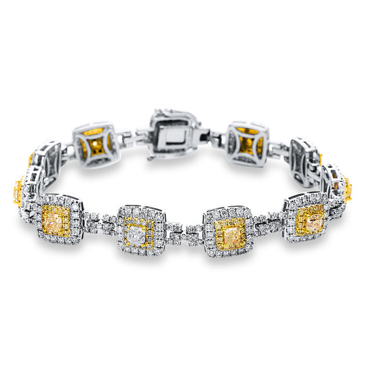 Armband 18 kt WG+GG, 341 Brill. 3,37 ct, TW-si, 11 Cushion 2,72 ct, gelb, 154 Brill. 1,07 ct, gelb