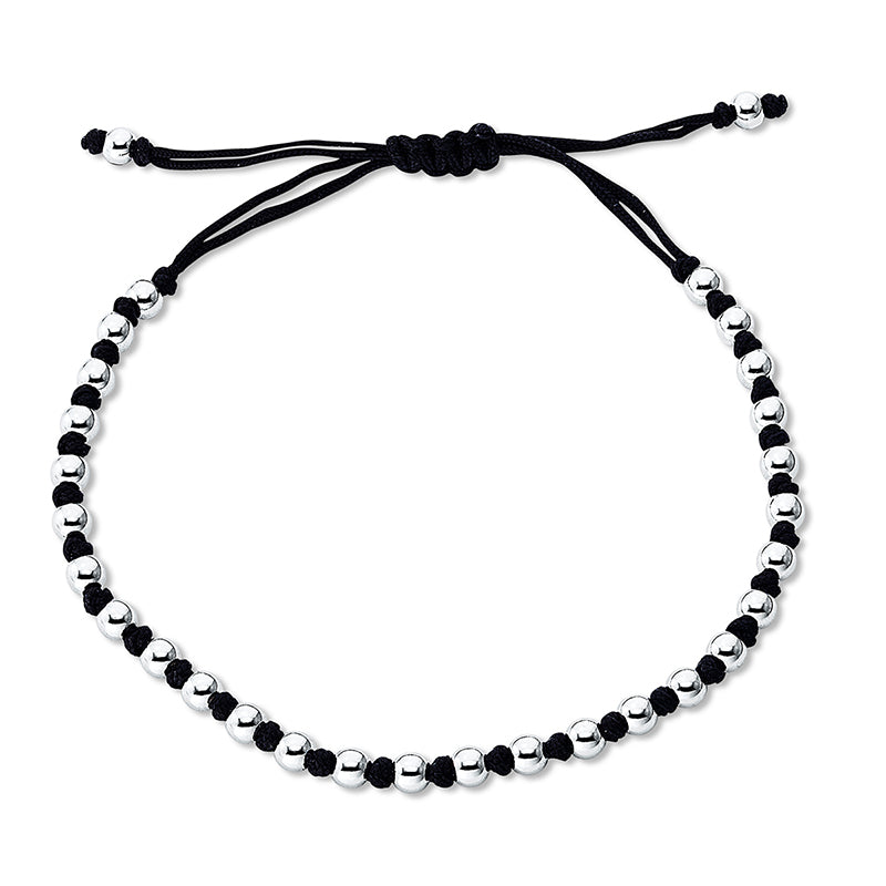 Armband 18 kt WG, black cord strap