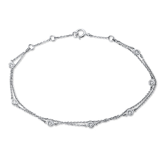 Armband 18 kt WG, 7 Brill. 0,19 ct, W-si