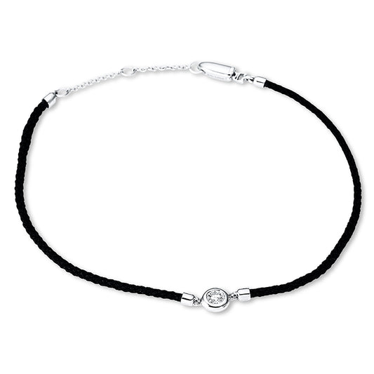 Armband 18 kt WG, black cord, 1 Brill. 0,09 ct, TW-si
